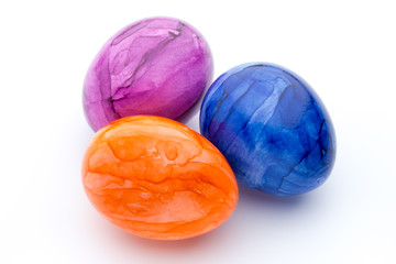 Easter eggs painted in colors on a white background.