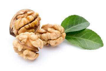 Walnut and walnut kernel isolated on the white background.