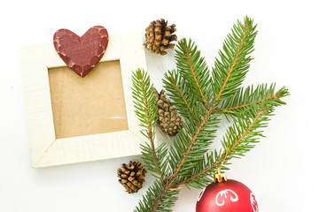 Frames made of wood. Fir branches and cones.