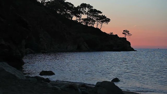 scenic sunrise background sun rising. timelapse of sun rising behing sea and mountains