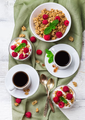 Breakfast concept. Coffee muesli granola berries homemade yogurt