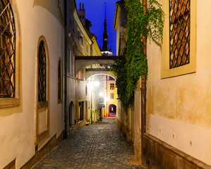 Fototapeta na wymiar Narrow street in Olomouc, in the evening, Czech Republic