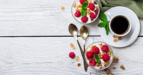 Breakfast concept. Coffee muesli granola berries homemade yogurt