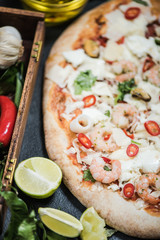 making healthy seafood pizza