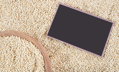 Quinoa seeds in wooden bowl