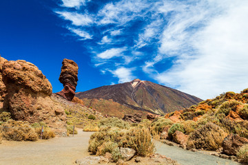 Roques de Garcia, with volcano in the background, in Teide National Park, Tenerife, Canary Islands,...