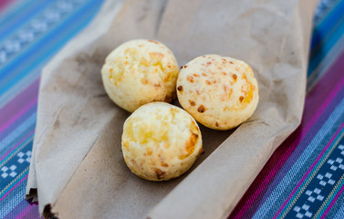 Traditional Brazilian and Paraguayan pan de queso or cheese bread at a street food market