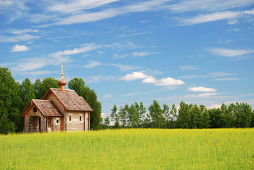 Obraz premium Finnish landscape with small wooden church.