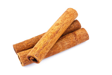 Three cinnamon sticks isolated on white background.