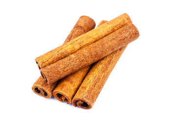 Group of cinnamon sticks isolated on white background.