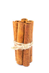 Group of cinnamon sticks isolated on white background.