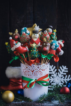 Cake pops with Christmas decoration in the basket