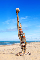 Balance and poise stones. Rock zen on the background of blue sky and sea