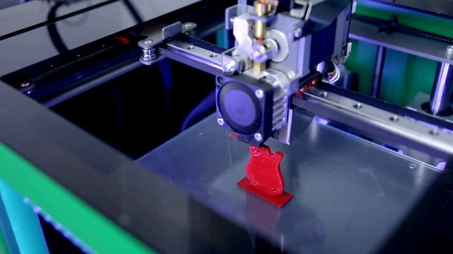 3D Printer. Printing with Plastic Wire Filament on 3D printer. HD.