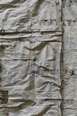 Wrinkled tarpaulin covering, Yangon, Myanmar