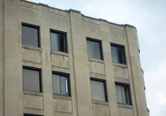 Obraz premium beige concrete building habitation or office place downtown