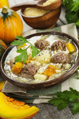 Cabbage soup with meatballs and pumpkin