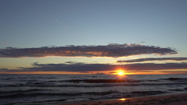 Fall sun setting over Lake Michigan