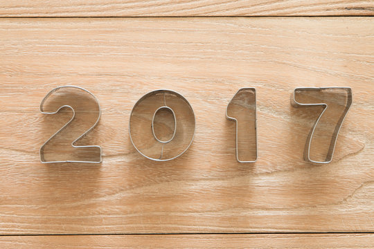New Year 2017 on a wood background