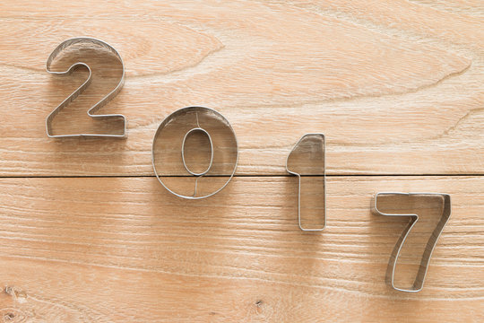 New Year 2017 on a wood background