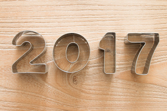 New Year 2017 on a wood background
