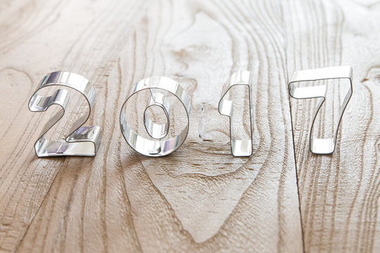 New Year 2017 on a wood background