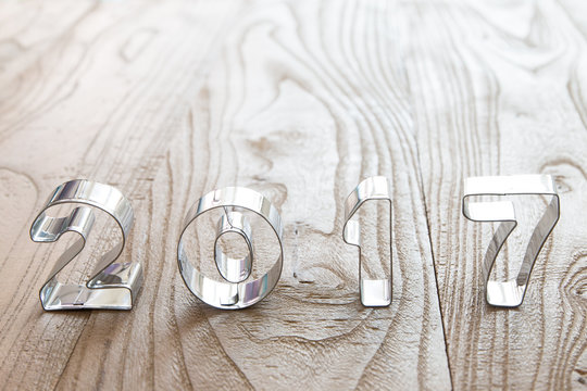 New Year 2017 on a wood background