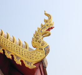 Fototapeta na wymiar Naga on the roof of temple Thailand