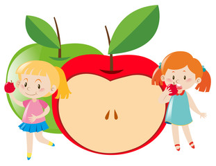 Two girls eating apple