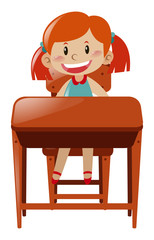Little girl sitting on desk