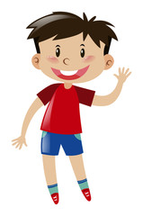 Boy in red waving hand