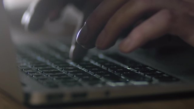Closeup of business woman using chat gpt ai and hand typing on laptop keyboard at night in office