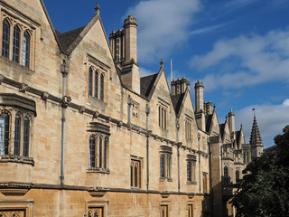 Fototapeta na wymiar Oxford University, exterior of gothic style building with gables and leaded glass windows