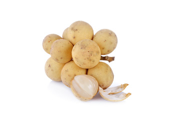 whole and peeled long kong fruit on white background