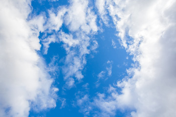 Fototapeta premium Blue sky with a lot of white puffy clouds