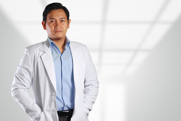 Young Attractive Asian Male Doctor Smiling