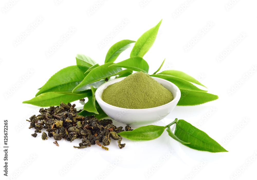 Wall mural powder green tea and green tea leaf  on white