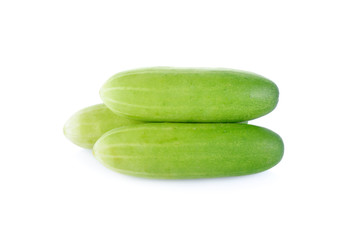 pile of whole cucumber on white background