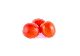 Three tomatoes isolated on white background