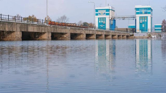NOVOSIBIRSK, RUSSIA - OCTOBER 23, 2016: floodgate and dam on Ob Sea in Novosibirsk, Siberia, Russia.