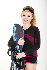 beautiful woman with a snowboard in studio. Portrait of a happy young girl snowboarding. Young blonde girl with a snowboard on white
