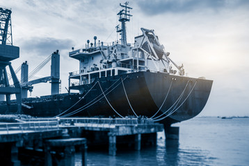 Cargo container ship at harbor.