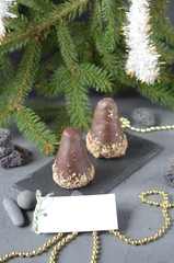 Christmas chocolates. place for signature  and christmas decoration side view