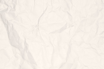 Crumpled light brown paper texture or paper background for design with copy space for text or image.