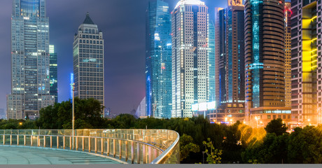 footbridge with cityscape at night in Shanghai,China.