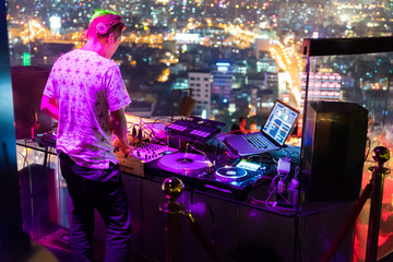 DJ - Party on top of building with music entertainment