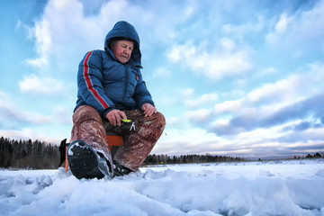 Fototapeta na wymiar Lake Winter Fisherman