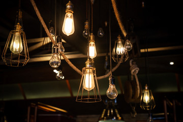 Fototapeta na wymiar Edison light bulb decor glowing