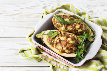 Italian eggplant with chopped meat and arugula
