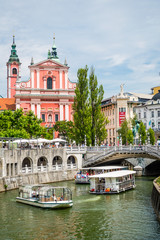 Ljubljana's city center: river Ljubljanica, Triple Bridge (Tromostovje), Preseren square and...